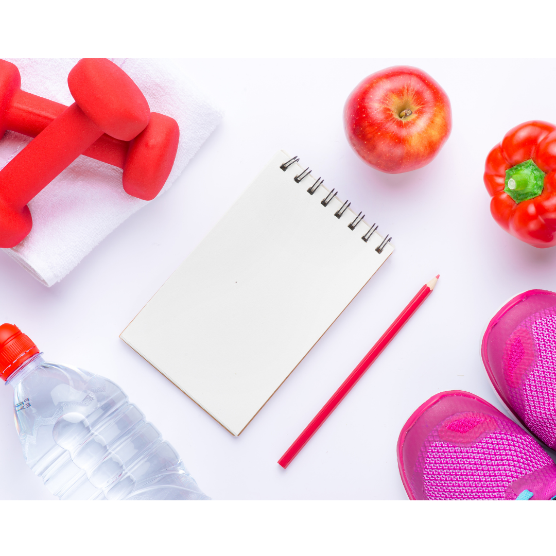 A notepad with fruit, vegetables and exercise gear