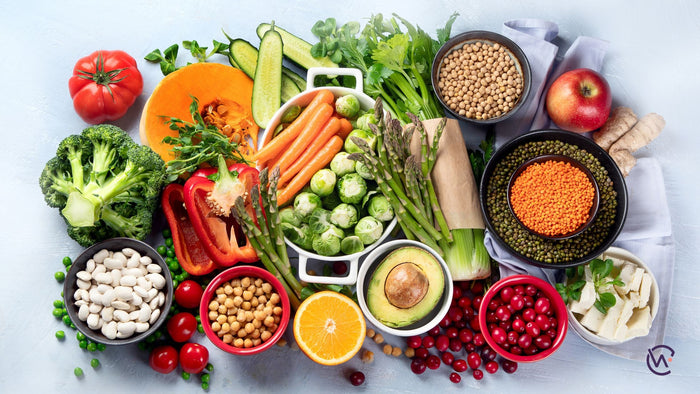 A variety of vegan ingredients including fruit, vegetables and grains
