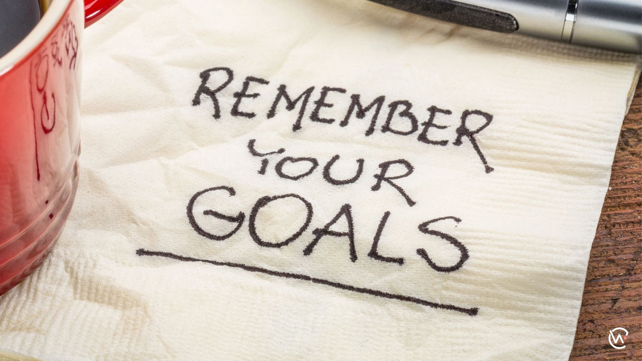 A napkin with the words "remember your goals"