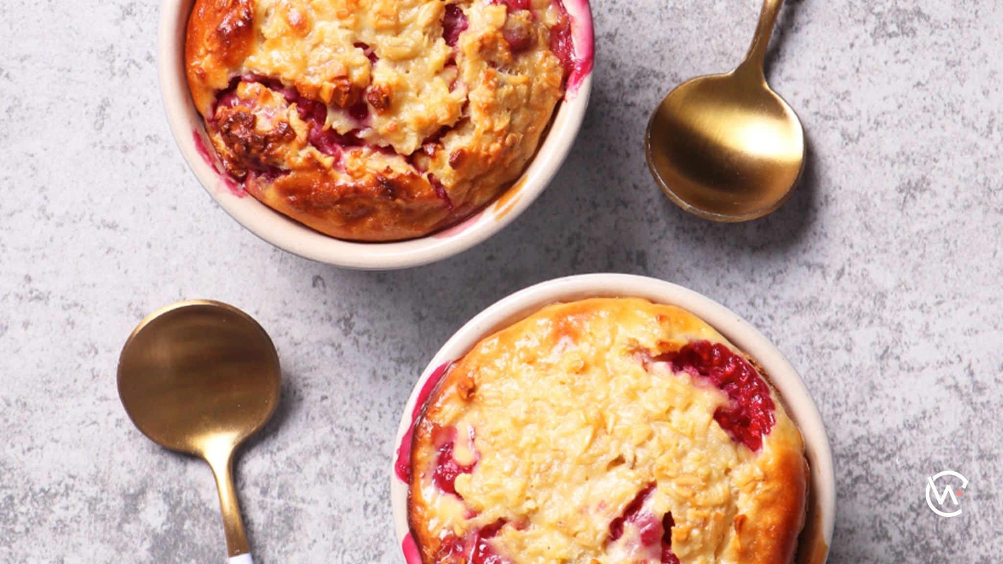 Two ramakins of baked oats with berries