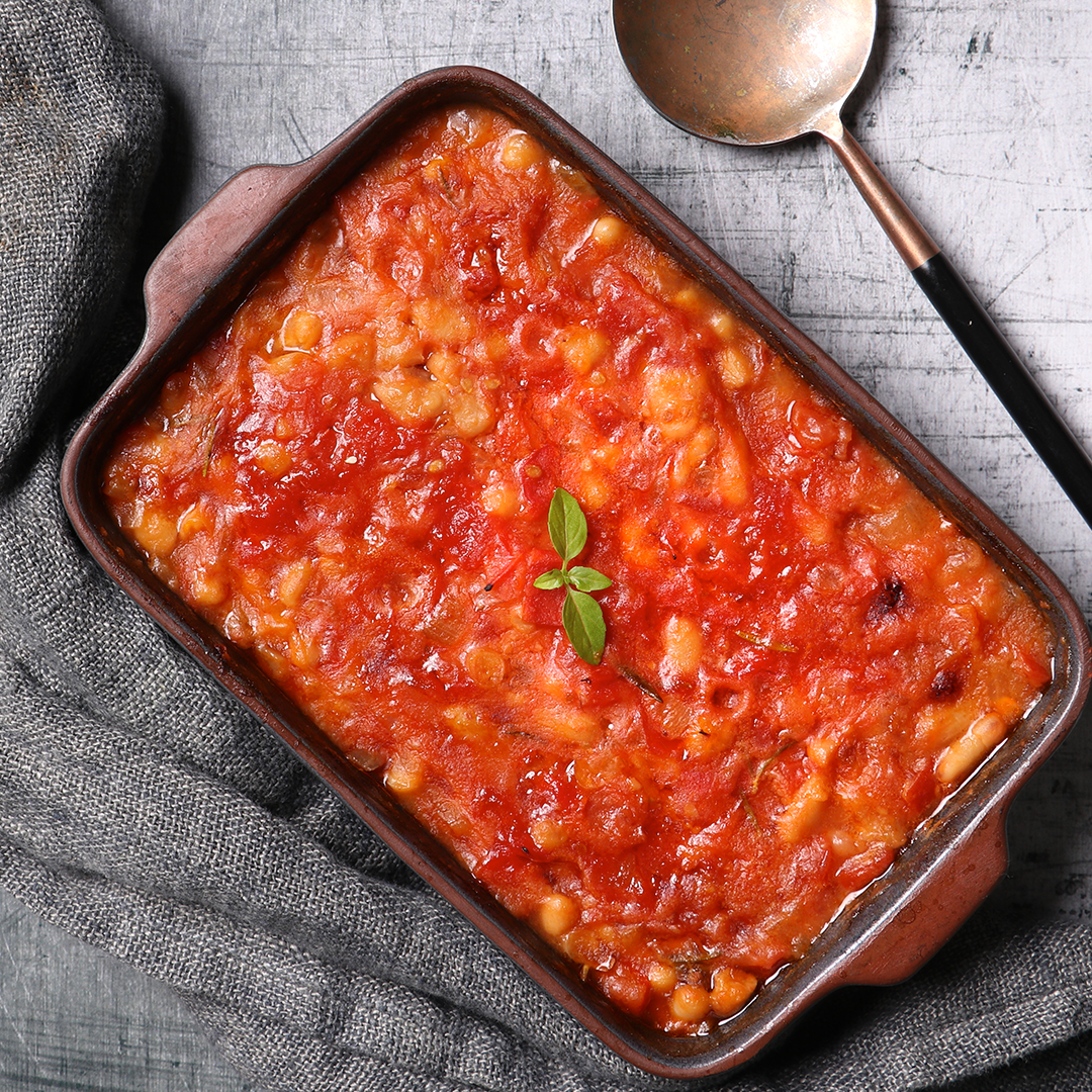 A dish of a baked beans in a tomato sauce