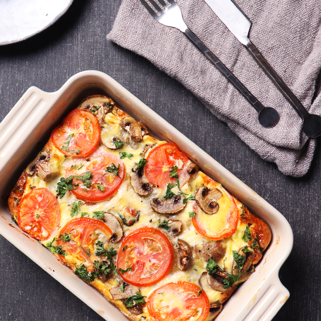 A dish of tomato and mushroom quiche