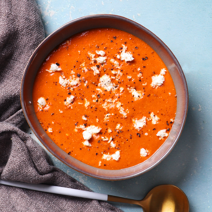 A bowl of Roasted red pepper and feta soup