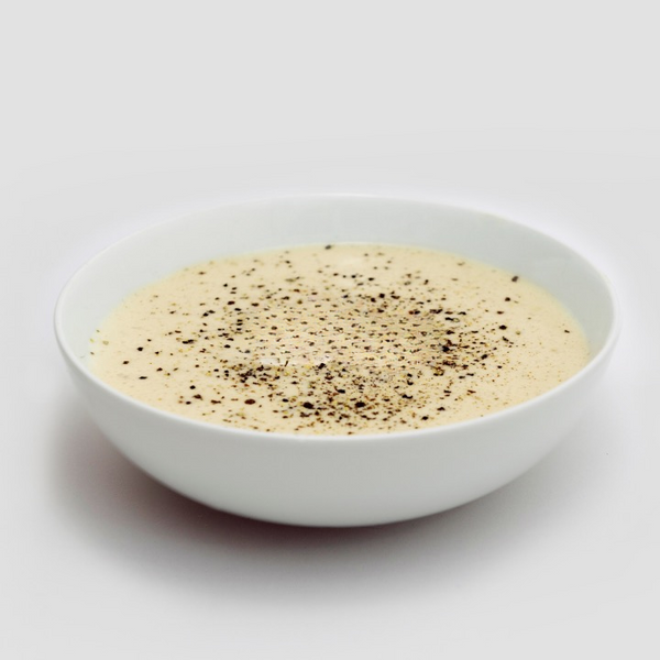 Prepared bowl of chicken and mushroom soup